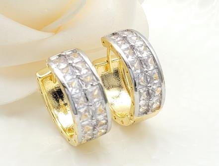 Arete Huggie Bicolor Oro y Rodio