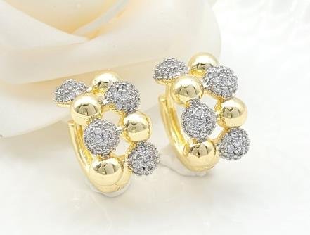 Arete Huggie Bicolor Oro y Rodio