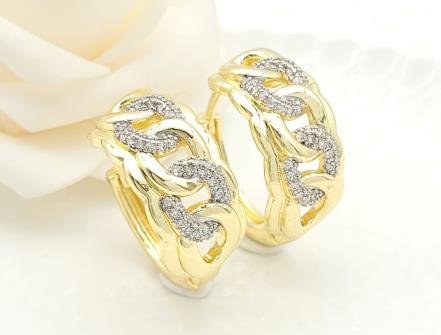 Arete Huggie Bicolor Oro y Rodio