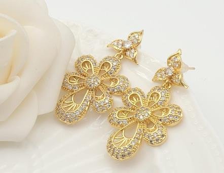 Arete Huggie Baño de Oro 18K