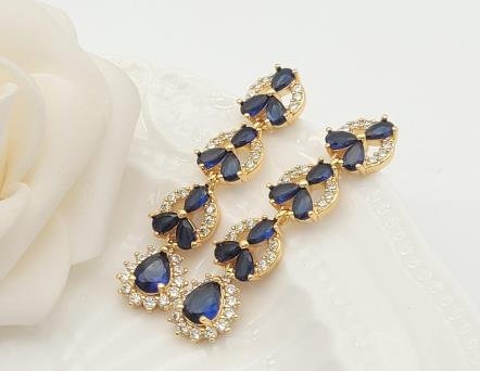 Arete Huggie Baño de Oro 18K