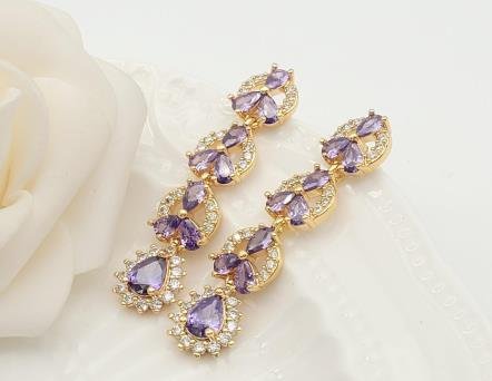 Arete Huggie Baño de Oro 18K