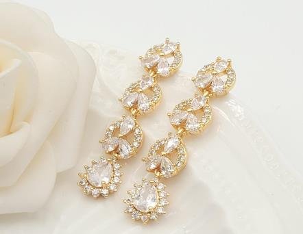 Arete Huggie Baño de Oro 18K