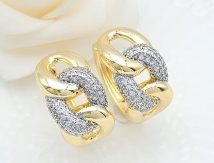 Arete Huggie Bicolor Oro y Rodio
