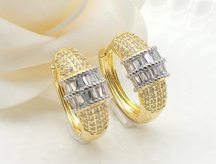 Arete Huggie Bicolor Oro y Rodio